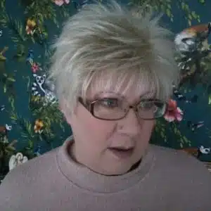 Patricia wearing Lizzy Wig in Creamy Blonde